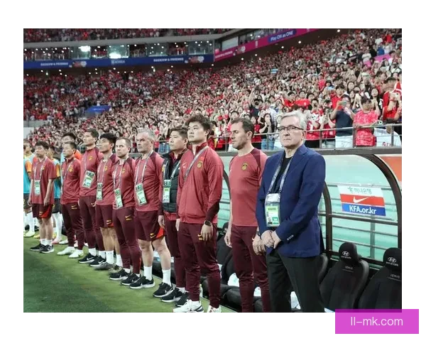中国男足凭新加坡队意外助力惊险晋级世预赛下一轮